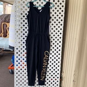 Black jumpsuit. Size Small. With tags/ never worn. Calvin Klein brand.